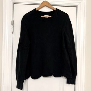 Black J Crew sweater with scallop detail. Size L.